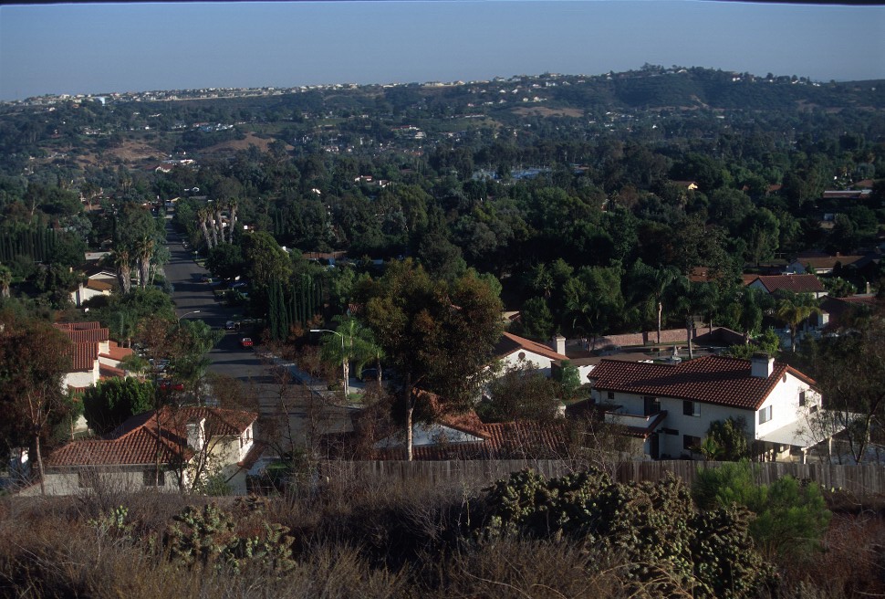 Rooftops and ridgelines across Bonita, seen from the southern hills